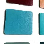 Various square pieces of PVC Floor Vinyl arranged in a grid on a white background.